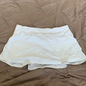 Lululemon tennis skirt with shorts underneath and pocket in back